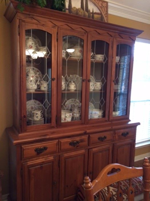 Large solid wood beautifully stylish china cabinet.  Tons of storage! China pictured not for sale.