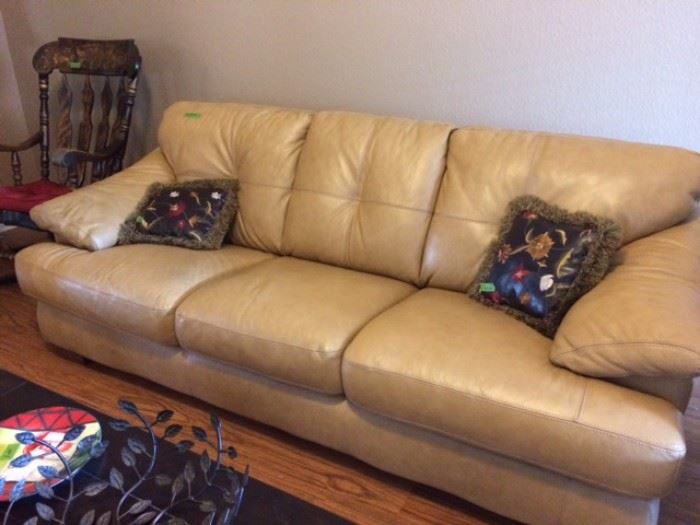 All leather Sofa, no tears or stains. 93" wide x 39" deep. Leather embroidered pillows sold separately.