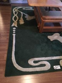Green and white area rug