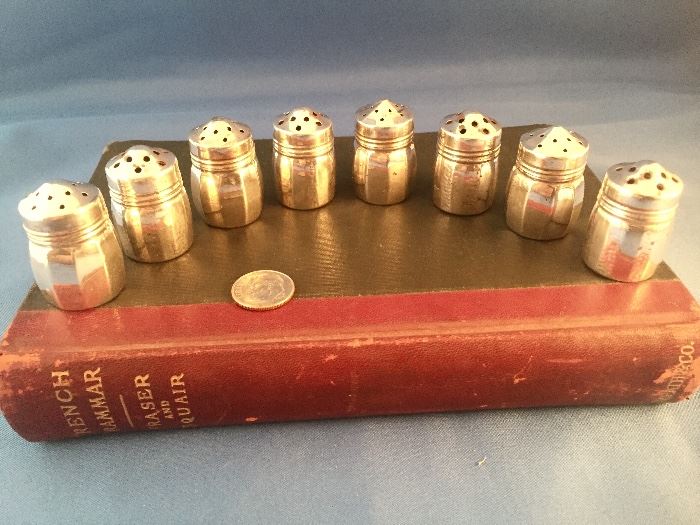 SET OF 8 STERLING SILVER INDIVIDUAL SALT & PEPPER SHAKERS . PEPPER SHAKERS HAVE  A HAMMERED FINISH TO DIFFERENTIATE THEM FROM THE SALTS