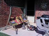 Outside swing, patio grill, electric mower.