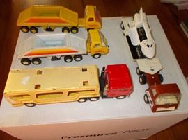 4 Toy Trucks and Trailers - 1970's - a couple are "Buddy L"