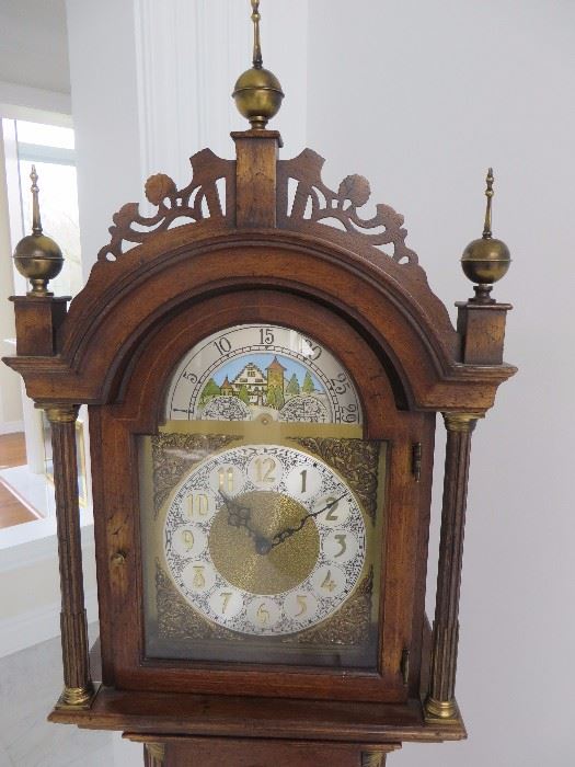 GRANDMOTHER CLOCK ROXBURY STYLE CASE WITH OPEN FRETWORK BONNET
COLONIAL CLOCK COMPANY (DETAIL OF FACE)

