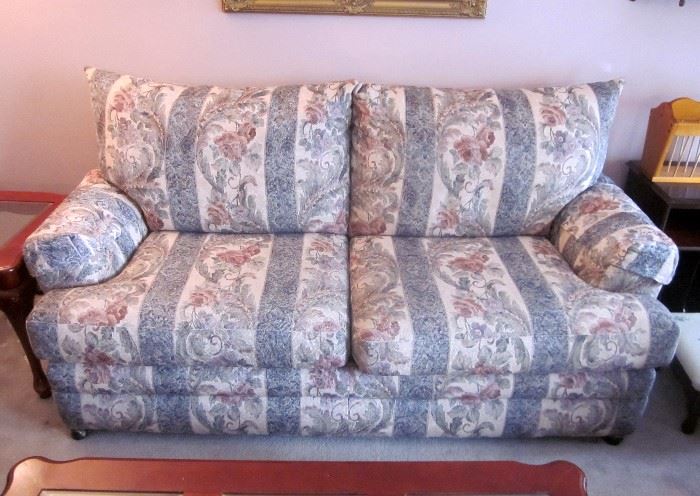 Overstuffed, very cushy, attached pillow back sofa on casters by Bassett.  77" wide