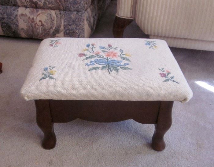 Wood foot stool, needlepoint top, opens for storage.