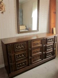 Double dresser, six drawers and mirror.  60" wide, 18" deep, 31" tall.