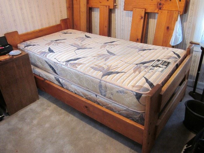 Solid, rustic style bunk beds. Can be assembled as traditional bunk beds, L-shape configuration where you can put a small desk under the upper bunk, or simply use as two twin beds.  Nice set.