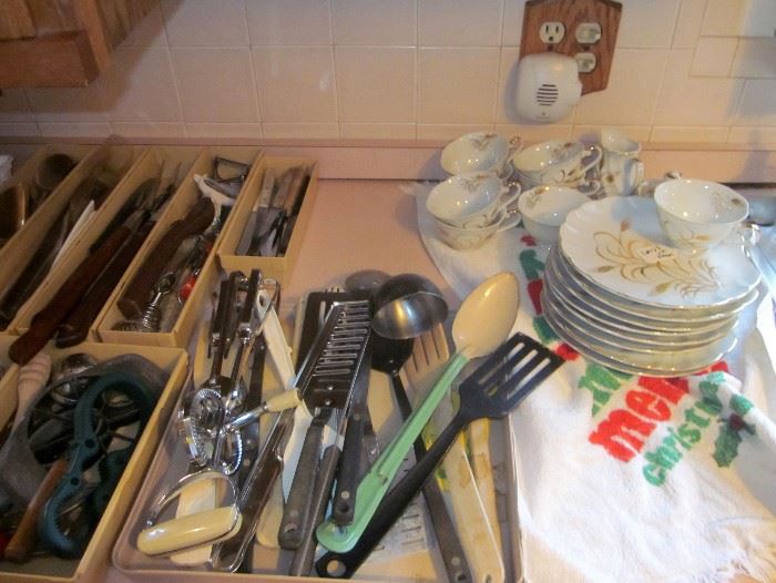 Kitchen utensils, some vintage.  Desert set, plus creamer and sugar bowl.
