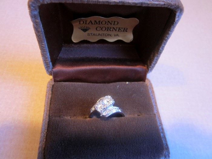 Ladies 14K white gold ring with multiple diamonds.  Appraised at $3500.