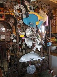 There is an Iron Garden Gate from an old Galveston Estate underneath all that stuff. 