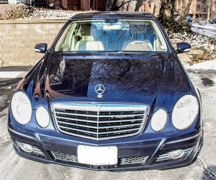 2008 Mercedes-Benz E350 Luxury Sedan: A 2008 Mercedes-Benz E350 4MATIC 4-door luxury sedan in Capri Blue. This E-Class vehicle features a 3.5 liter V6 engine, 5-speed shiftable automatic transmission, all-wheel drive, and anti-lock brakes. The interior is trimmed in wood grain with tan leather steering wheel and seats; it includes front, rear, and side airbags; heated seats; a CD player and radio with LCD display; cruise control; and more. The vehicle had a mileage of 115,717 at the time of cataloging; VIN is WDBUF87X88B253180.