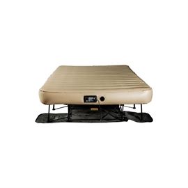 Frontgate Inflatable Queen Size Bed: This is an inflatable bed by Frontgate that inflates to a full 60" X 90" queen-sized mattress when full. The mattress and frame are stored in a black vinyl case with caster wheels for easy transport. The bed is equipped with its own built-in electrical pump which runs off of standard 120-volt household current for inflation.