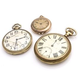 Assortment of Pocket Watches: An assortment of pocket watches. None of the watches are running.