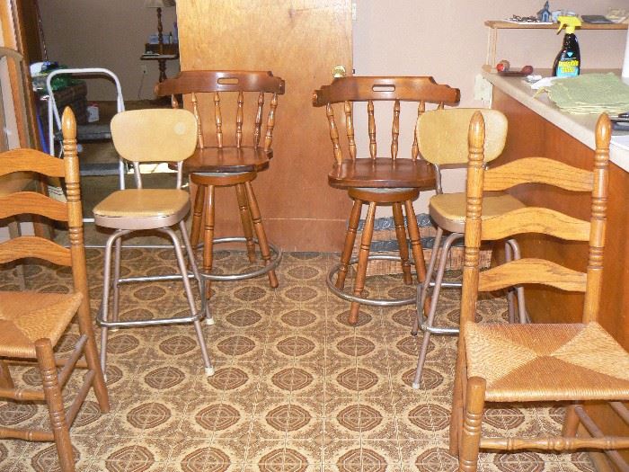 Assortment of wooden chairs and barstools
