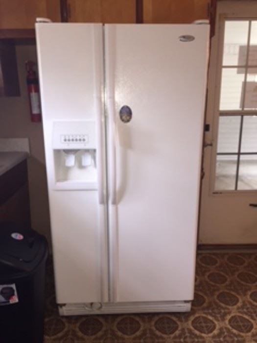 Frigidaire 22 Cu Ft. Refrigerator Side by Side.  New water filter.  The frig has a damaged door tray which is the only thing I can find wrong with the unit.  I think its about 5 years old.  Firm Pricing