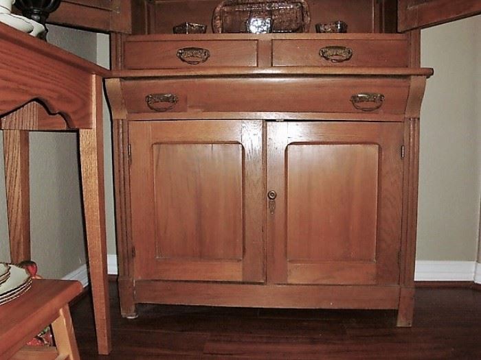 BOTTOM CUPBOARD OF CHINA CABINET