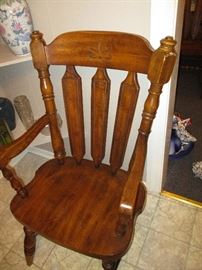 Part of a very heavy oak dining table, with six chairs.