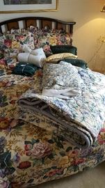 Sunshine Drapery floral comforter (folded on bed) bed skirt, pillows