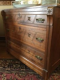 Beautifully restored, well maintained marble top dresser with matching wash stand. There is also a twin headboard that matches the set. 