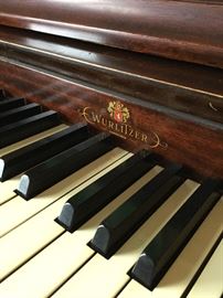 Wurlitzer upright piano. Needs tuning. 