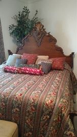 Wonderful carved King bed with the linens