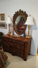 This dresser/chest and mirror will look wonderful in any room. It could be in an entry, in a dining room for linens, or a living room. It looks great in this bedroom.