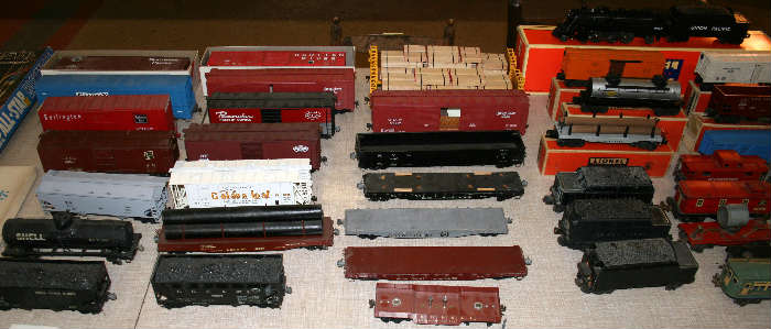 2 Rail O gauge ready to run cars. Some cars may be brass. Some large well detailed & unique cars.