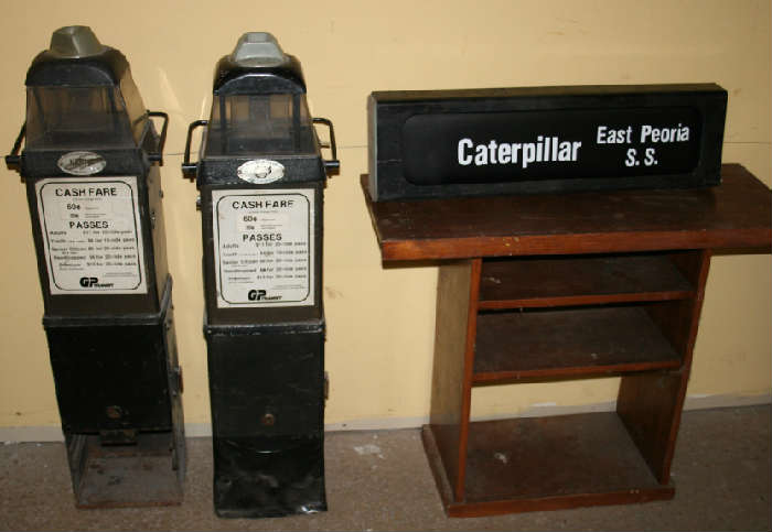 2 fare boxes and 1 route sign from old GP Transit buses. Route sign has about 20 different Peoria are stops that were popular in the 1970's that you can rotate....they are on a big banner that you crank from the back to change.