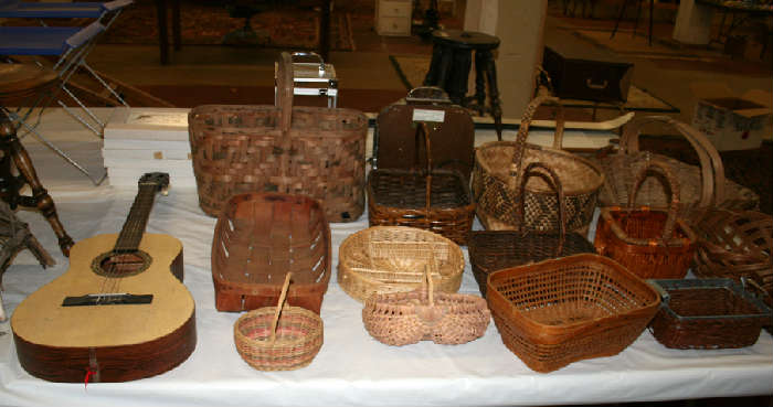 Baskets and student acoustic guitar.