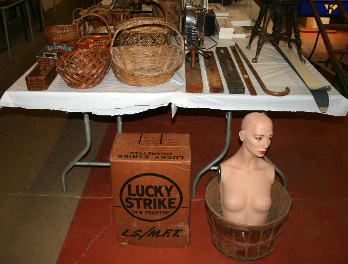 Oversize Lucky Strike box and mannequin that is half off....the bottom that is!