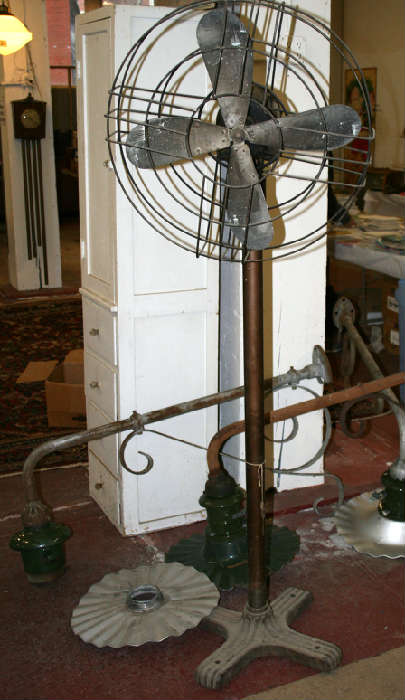 Cool large very heavy industrial fan. Needs to be rewired. Can also be used as vegetable slicer.