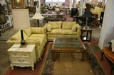 Get comfy with these 2 nice floral couches. Coffee tables and end tables and more lamps.