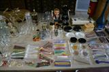More barware including lots of stir sticks from area bars and restaurants and ash trays, shot glasses and other barware from Las Vegas