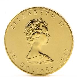 1983 Canadian Maple Leaf $50 Gold Coin: A 1983 Canadian Maple Leaf $50 gold coin. Mintage: 843,000. Metal content: 99.99% gold. Diameter: 30 mm. Weight: One troy ounce. Very good condition.