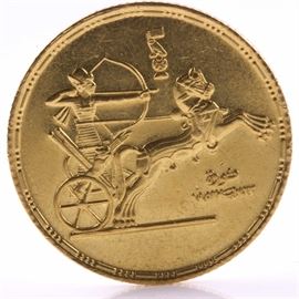 1955 Egyptian One Pound Gold Coin: A 1955 Egyptian one-pound gold coin. Mintage: 16,000. Metal content: 87.5% gold. Diameter: 24 mm. Weight: 8.5 grams. Very good condition.