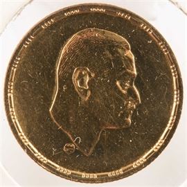 1970 Egyptian Nasser One Pound Gold Coin: A 1970 Egyptian Nasser One Pound gold coin. Mintage: 10,000. Metal content: 87.5% gold. Diameter: 24 mm. Weight: 8 grams. Very good condition.