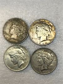 Four Peace Silver Dollar Coins