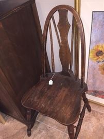 One of two antique chairs