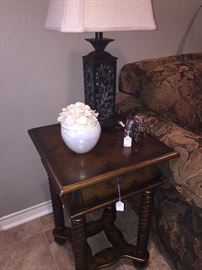 One of two matching side tables