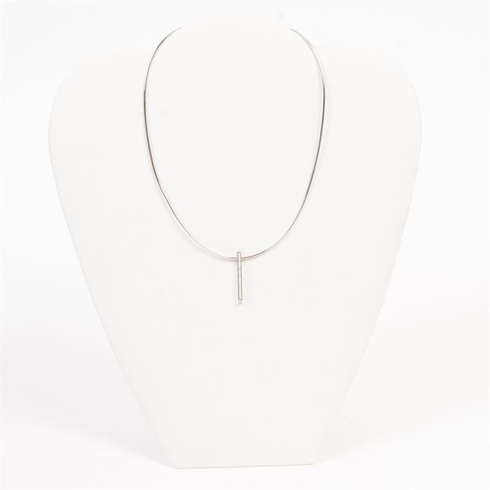 18K White Gold and Diamond Movado Necklace: An 18K white gold and diamond pendant on snake chain by Movado. This necklace comes in the original case.