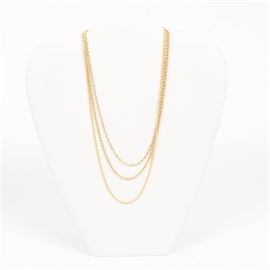 Collection of 18K Gold Hollow Necklaces: A collection of three 18K gold hollow necklaces including two rope chains and one cable chain.
