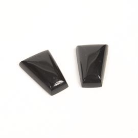Pair of Black Onyx Trapezoid Cabochons: A pair of black onyx trapezoid stones.