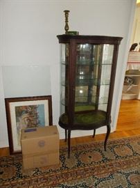 Early French Provincial display , inlaid and double curved front glass. 