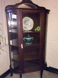 Curved glass china cabinet with mirror