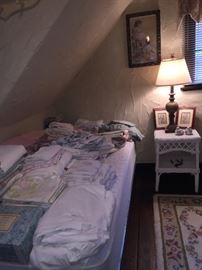 Twin size bed & linens.
