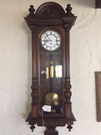 Nice wall clock with brass weights. 