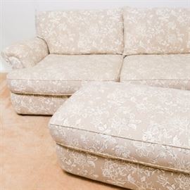 Sofa Express Country Floral Loveseat: A Sofa Express country floral loveseat and ottoman.. This modern taupe linen loveseat is decorated in a floral pattern and has two unattached pillow backs and comes with 3 matching decorative pillows in chocolate brown and white. The matching ottoman measures 46.5"W 18"H 30"D.