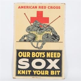 World War I American Red Cross Poster: A World War I American Red Cross poster. This World War I era propaganda poster implores women to contribute to the war effort by knitting socks for soldiers. A sewing basket, complete with knitting needles and yarn, is depicted alongside the phrase “Our boys need SOX, knit your bit.” This lithograph poster is printed on paperboard and marked “American Lithographic Co. N.Y” at lower center.