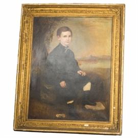 19th Century American School Portrait Of A Young Boy, Oil on Canvas: An oil on canvas portrait of a young boy. This large-scale portrait depicts a boy somberly dressed in black, Victorian attire. He is portrayed outdoors, seemingly at sunset, with a tree over his shoulder and hilly terrain in the background. He gazes solemnly at the viewer, seated on large rock with his button-booted foot propped on a smaller rock. This unsigned oil painting is displayed in an ornate wood and gesso gold-toned frame.
