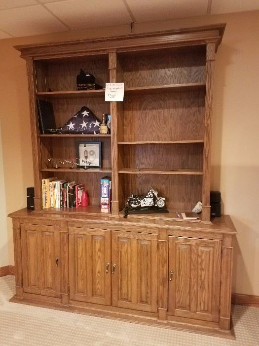 Large solid oak wall unit with book shelving and 4 doors with shelves